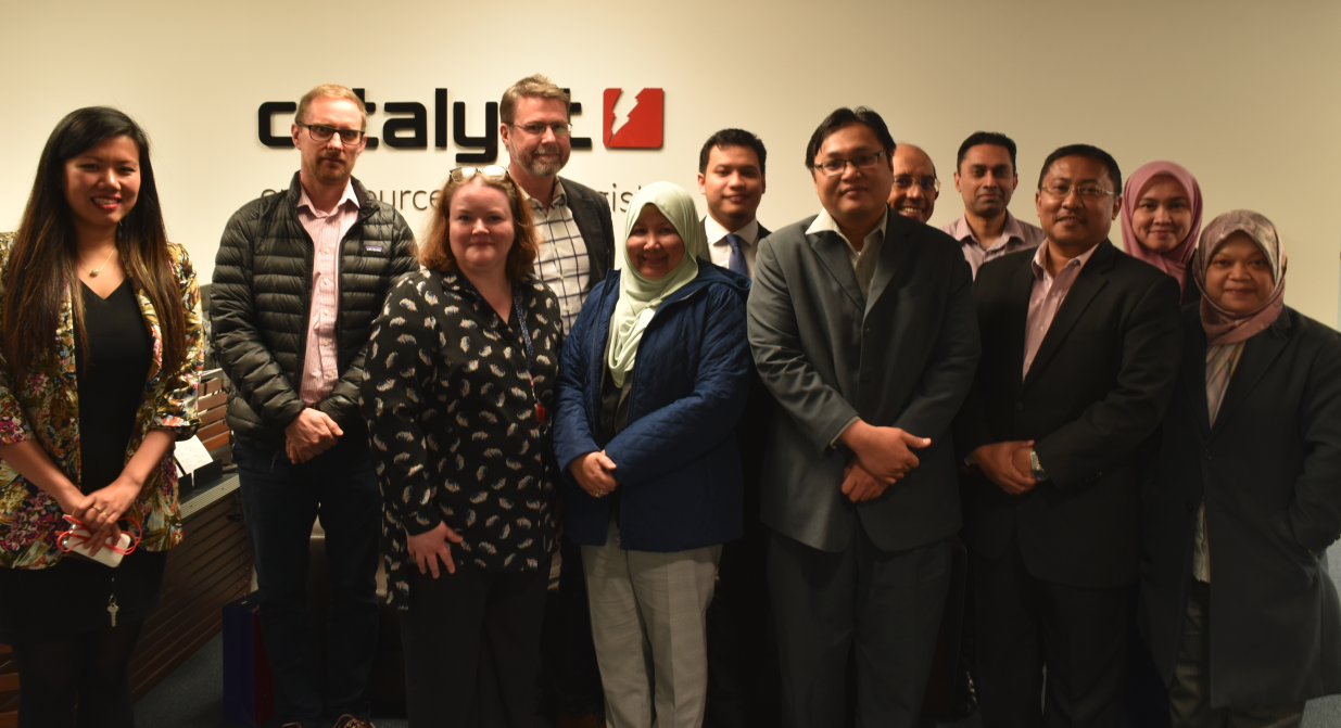 Group photo of Catalyst's people and the Malaysian Govt.