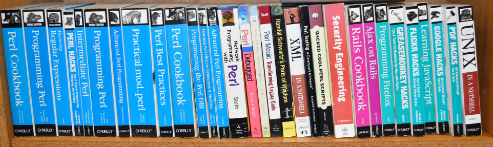 Shelf containing programming books