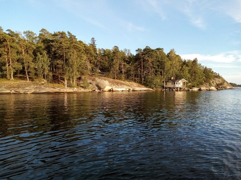 One of the rocky, forested islands in the Helsinki harbour taken from the sea cruise taken by the Kohacon attendees