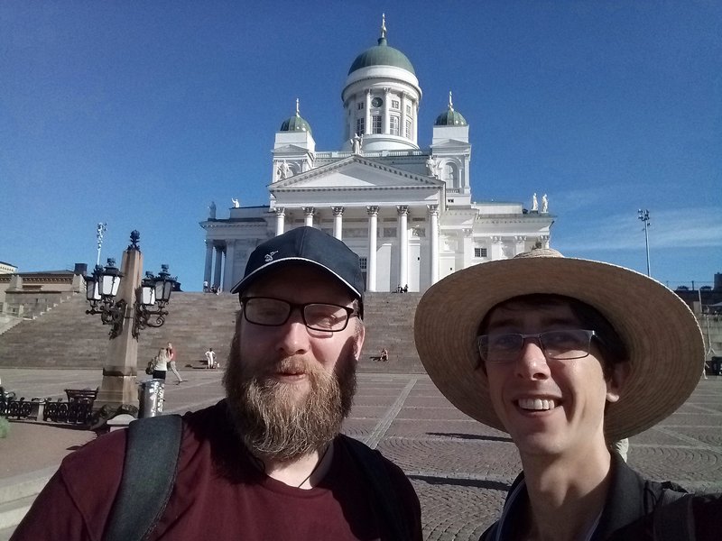 Chris Cormack and Alex Buckley on their way to the Helsinki harbour sea cruise with the white and green doomed Helsinki Cathedral in the background